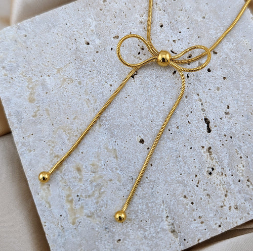 Golden Bow Pendant Necklace